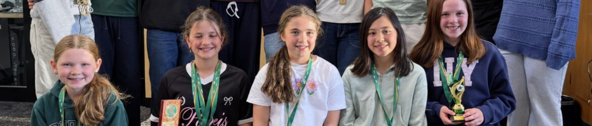 GHC Under 12 girls with medals and trophies at the 2026 junior presentations