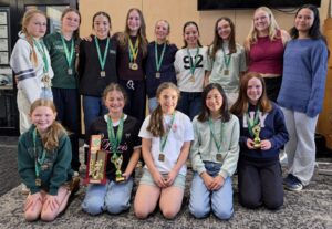 GHC Under 12 girls with medals and trophies at the 2026 junior presentations